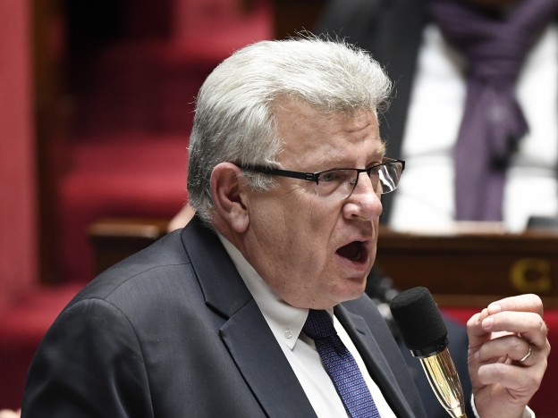 French Junior Minister for Budget Christian Eckert speaks during a session of questions to the government, on January 24, 2017 at the National Assembly in Paris. / AFP PHOTO / bertrand GUAY